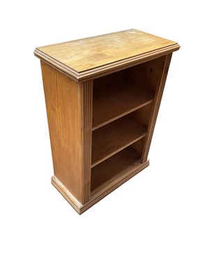 Lot 2116 - A modern pine dwarf open fronted bookcase, on...