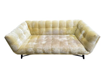 Lot 2038 - A modern two seater sofa, with pale gold...