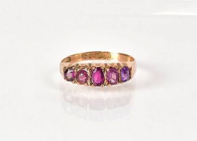 Lot 1051 - A 9ct yellow gold ring set with five graduated...
