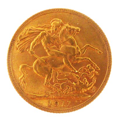 Lot 931 - A George V 1911 sovereign, George & Dragon,...