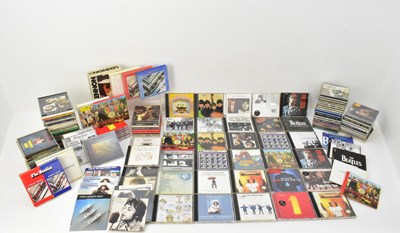 Lot 473 - THE BEATLES; over one hundred related CDs...