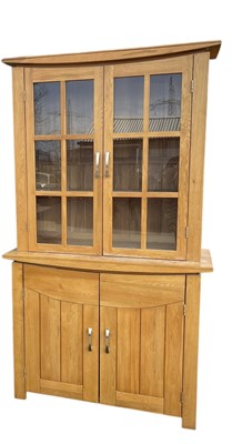 Lot 2088 - A modern light oak bookcase, with a pair of...
