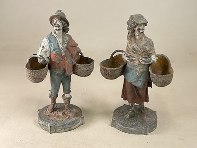Lot 187 - A pair of cast metal figures of a man and...