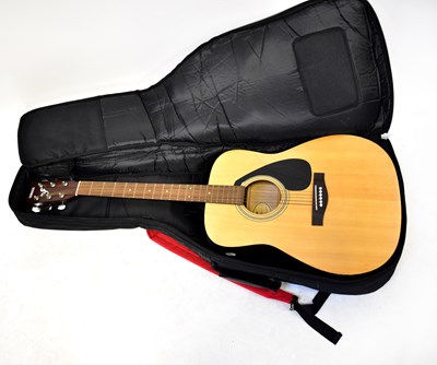 Lot 787 - YAMAHA; an F-310 six-string acoustic guitar,...