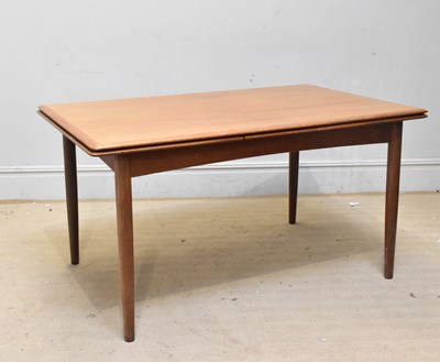 Lot 2047 - A mid century Danish extending teak dining...