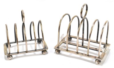Lot 1168 - An Edwardian hallmarked silver four division toast rack