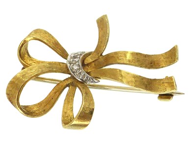 Lot 1126 - A modern 18ct gold brooch in the form of a...