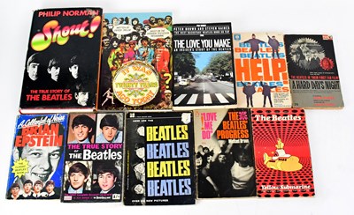 Lot 397 - THE BEATLES; ten mostly paperback books...