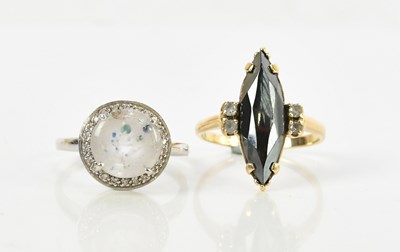 Lot 138 - A 9ct white gold dress ring, size O, and a 9ct...