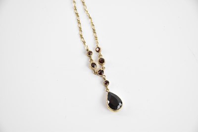 Lot 393 - A 9ct yellow gold garnet set necklace, with...