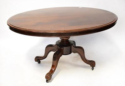Lot 55 - A Victorian mahogany oval tilt-top breakfast...