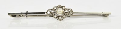 Lot 277 - A 9ct white gold bar brooch set with a seed...