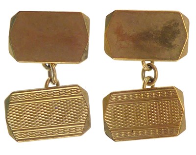 Lot 1198 - A pair of Art Deco 9ct gold cufflinks united...