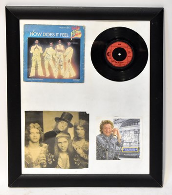 Lot 387 - SLADE; a framed display, the top left...