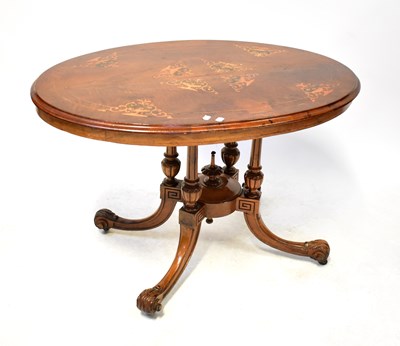 Lot 56 - An Edwardian inlaid walnut oval tilt-top...