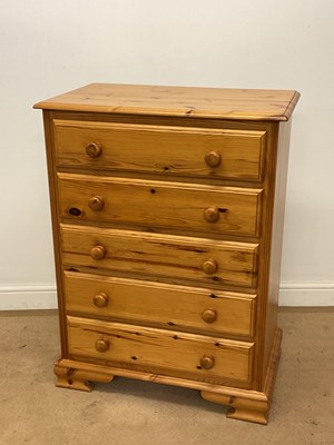 Lot 739 - A pine chest of five long drawers, height...