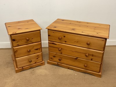 Lot 741 - A pine chest of three long drawers and a...