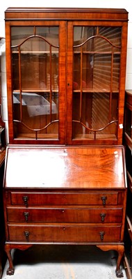 Lot 89 - A Georgian-style mahogany bureau bookcase with...