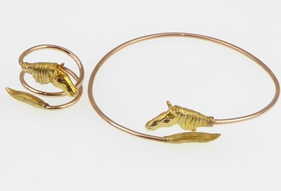 Lot 1211 - A 9ct gold contemporary bracelet, the ends...