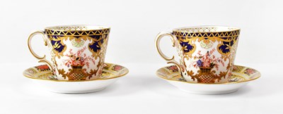Lot 221 - ROYAL CROWN DERBY; a pair of Imari cabinet...