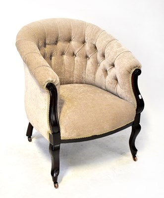 Lot 40 - An Edwardian mahogany tub chair with button...