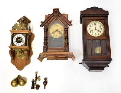 Lot 190 - FRANZ HERMLE, GERMANY; an oak brass-mounted...