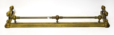 Lot 83 - A brass fire fender, together with a pair of...