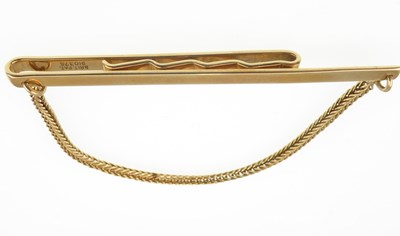 Lot 1206 - A 9ct gold tie pin of bar form with...