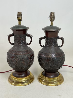 Lot 7 - A pair of 19th century Chinese bronze twin...