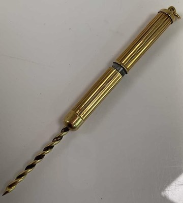 Lot 582 - An 18ct yellow gold cigar spike, with steel...