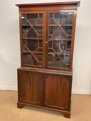 Lot 768 - A mahogany astragal glazed bookcase with...