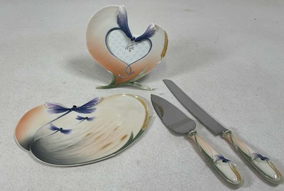Lot 225 - FRANZ PORCELAIN; a knife, slice, frame, and...