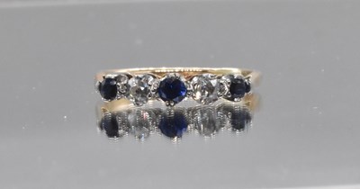 Lot 549 - An 18ct yellow gold sapphire and diamond five...