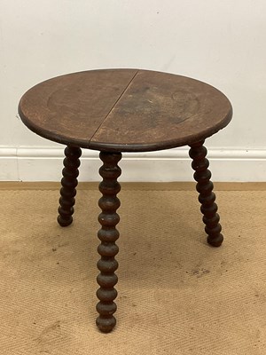 Lot 766 - An oak gypsy table with bobbin turned legs,...