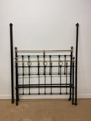 Lot 713 - A 19th century cast iron and brass bedstead on...