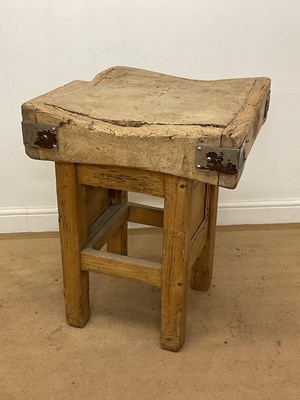 Lot 536A - A butcher's block with metal corner straps on...