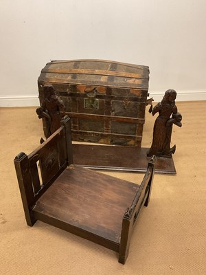 Lot 726 - A domed trunk with metal and wooden banding,...