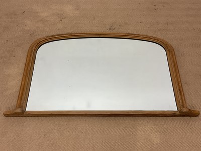 Lot 752 - A pine framed overmantel mirror, 66 x 98cm.