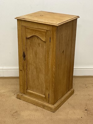 Lot 727 - A pine pot cupboard with panelled door, height...