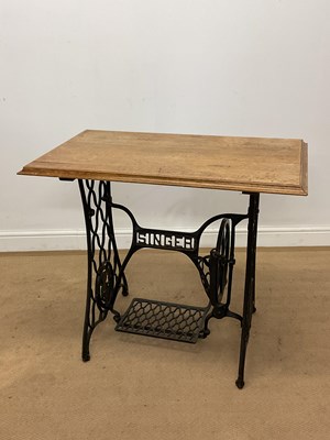 Lot 776 - A Singer sewing table, height 76cm, width 88cm,...