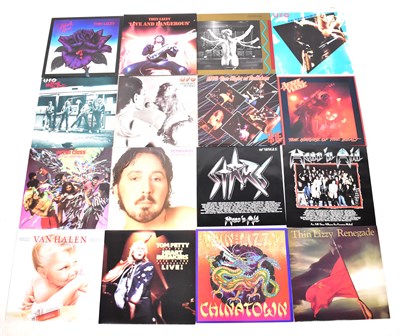 Lot 573 - ROCK; a quantity of LPs and 12" singles, to...