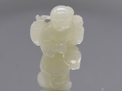 Lot 28 - A 19th century Chinese carved mutton fat jade...