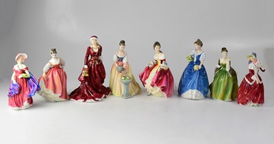 Lot 451 - ROYAL DOULTON; eight figures comprising...