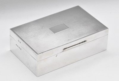 Lot 444 - An Elizabeth II hallmarked silver cigarette...