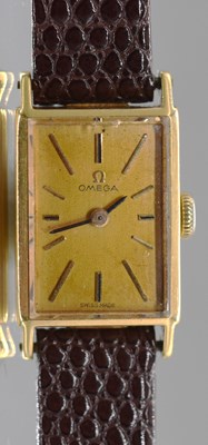 Lot 624 - OMEGA; a lady's 18ct yellow gold cased...