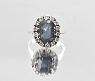Lot 528 - A white metal sapphire and diamond cocktail...