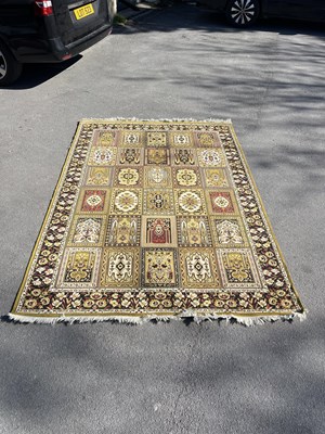 Lot 2522 - An Afgan rug, decorated in rectangular...