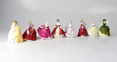 Lot 448 - ROYAL DOULTON; eight small figures comprising...