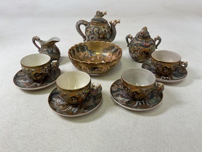 Lot 58 - A Japanese late Meiji period Satsuma part tea...