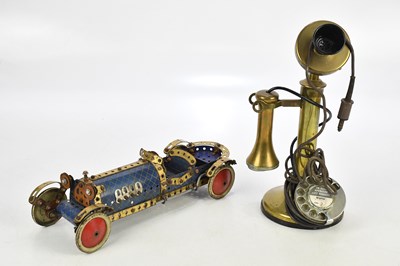 Lot 2322 - A vintage brass candlestick telephone and a...